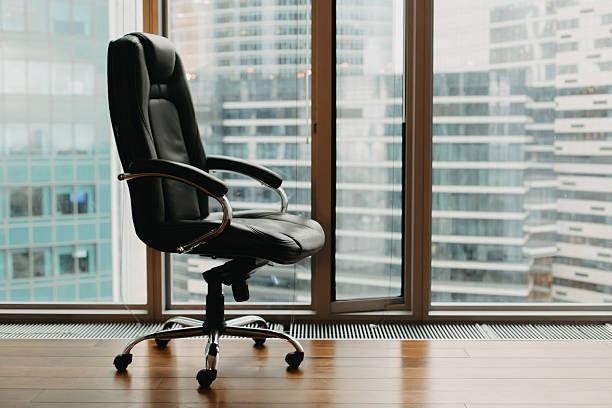 istock An office chair by the office window in a skyscraper. 2248734134