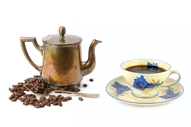 istock Antique Silver Coffee Pot with Floral Cup and Beans 2248734921