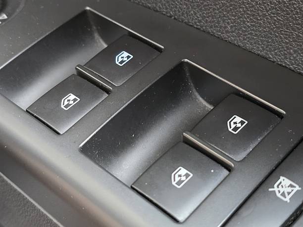 istock Close-Up View of Vehicle Power Window Control Panel with Buttons 2248735493