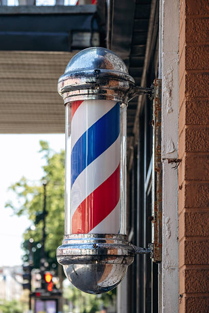 istock Traditional barbershop pole with red, white and blue stripes, Montreal, Canada 2248741949