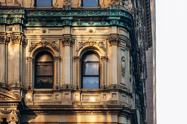 istock Ornate historic facade on Rue Saint-Jacques with arched windows and detailed stonework in downtown Montreal 2248741983
