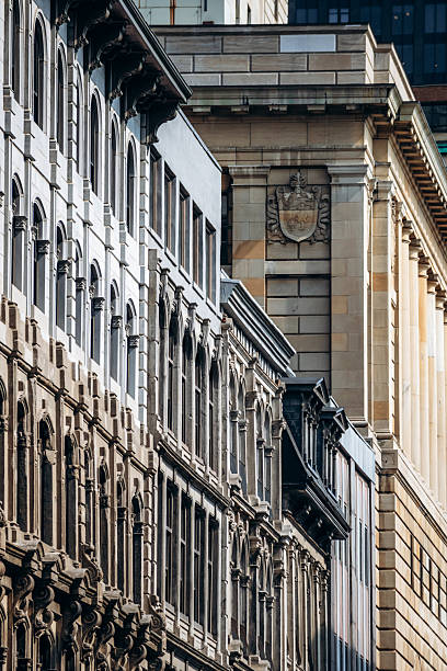 istock Downtown architectural ensemble of historic facades with columns and ornate masonry in Montreal 2248742175