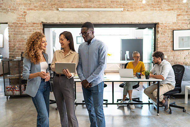 istock Diverse startup business team collaborating on digital tablet in office 2248743227