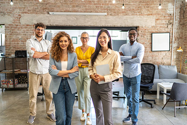 istock Diverse business team standing in modern office 2248744981