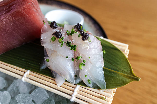 istock White fish sashimi with caviar and tuna sushi 2248748935