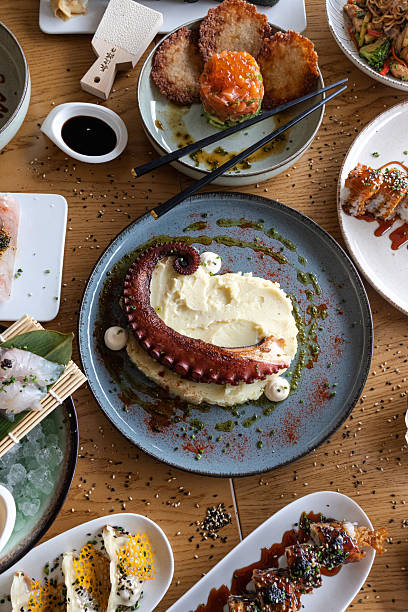 Japanese fine dining octopus with seafood dishes on table