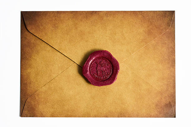 istock Vintage Sealed Envelope. An aged paper envelope sealed with a red wax stamp 2248761471