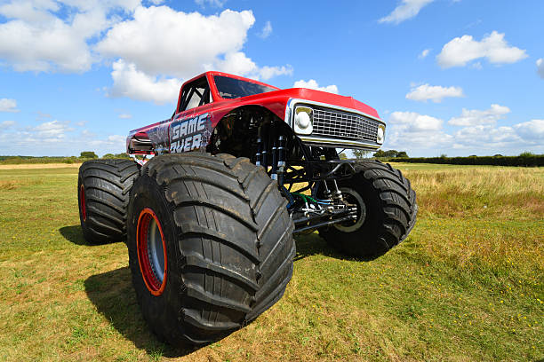 Little Gransden, Cambridgeshire, England -  AUGUST 25, 2024: Game Over Monster Truck close up parked on grass