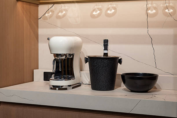 istock White manual coffee machine near wine bucket on countertop 2248761811