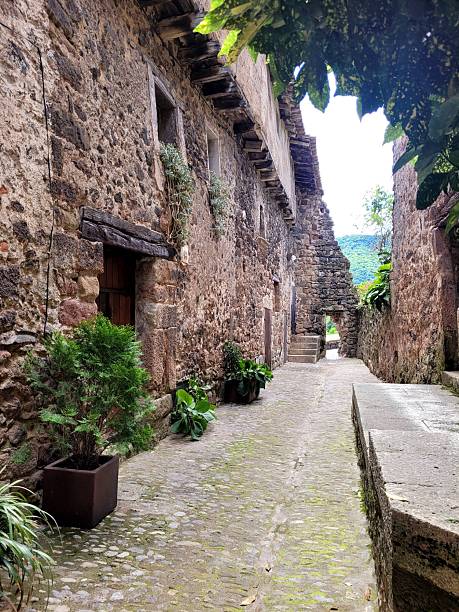 istock Quiet Stone Alleyway in a Historic Village with Rustic Architecture 2248763033