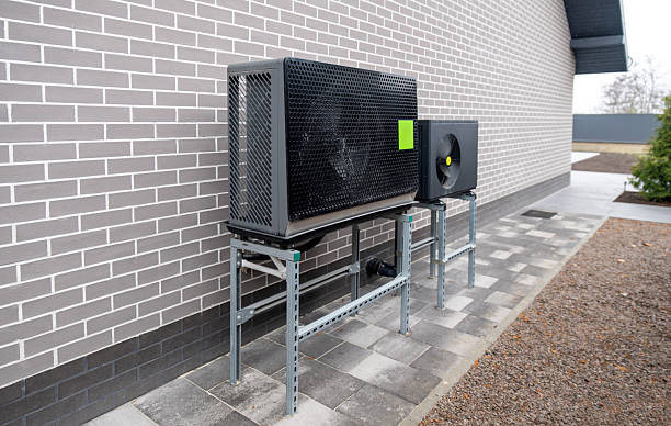 istock Heat pump outdoor units installed on metal stands 2248763586