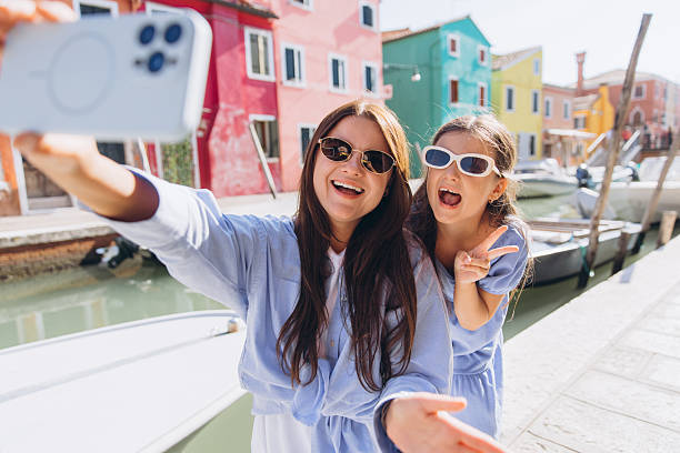 istock Girls making selfie enjoying vacation in Burano 2248763674
