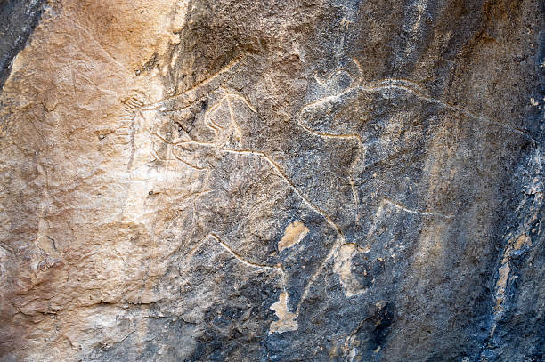 istock Bull Petroglyph Figures Carved in Stone at Qobustan 2248766478
