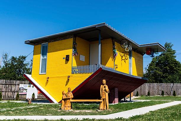 Poienari, Romania – August 04, 2022: Overturned unique Romania house in Poienari, Gorj.