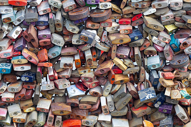 Cologne, Germany, September 26, 2025: Many locks hang on the Hohenzollern bridge - Cologne's love lock bridge