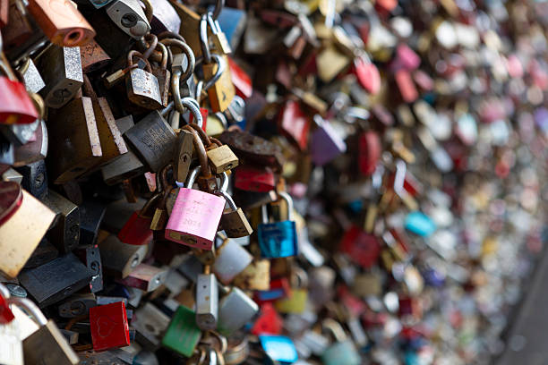 Cologne, Germany, September 26, 2025: Many locks hang on the Hohenzollern bridge - Cologne's love lock bridge