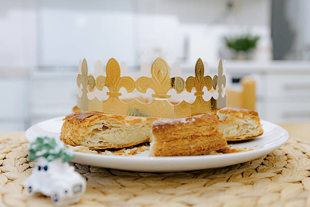 istock A cut royal galette with a golden crown on the table. 2248776372