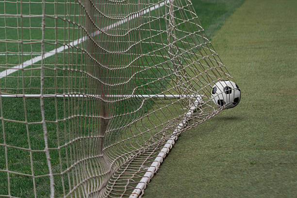 Close-up of white soccer goal net