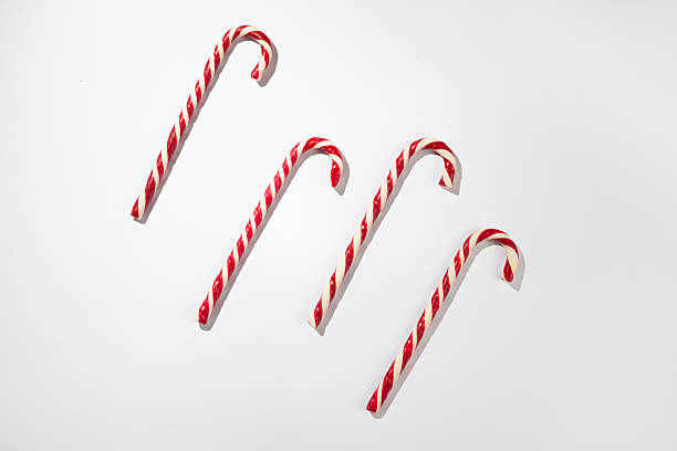 istock Minimal composition with christmas lollipops on color background, top view 2248779167
