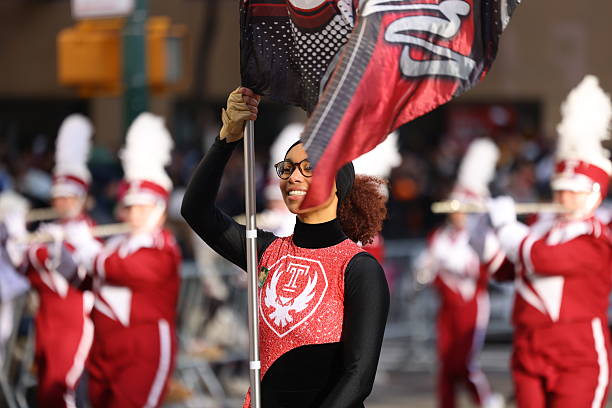 Marching band student playing the trumpet.
