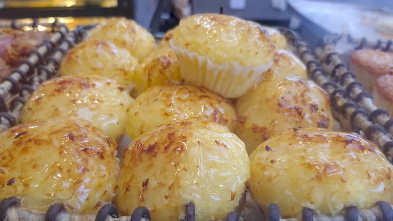 Delicious queijadinhas, traditional Brazilian sweet, in a Brazilian bakery.