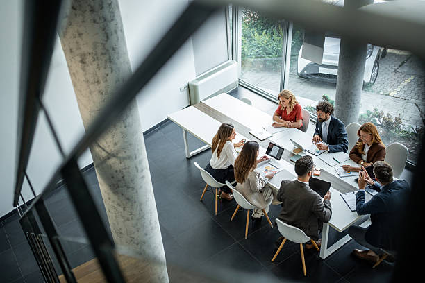 istock Business team collaborating during meeting in modern office 2248787464