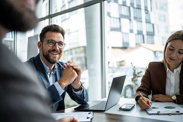 istock Business professionals collaborating at corporate meeting 2248787475