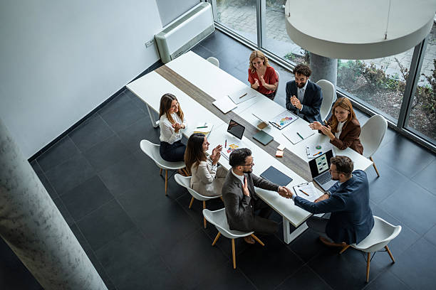 istock Business people shaking hands after successful deal 2248787549