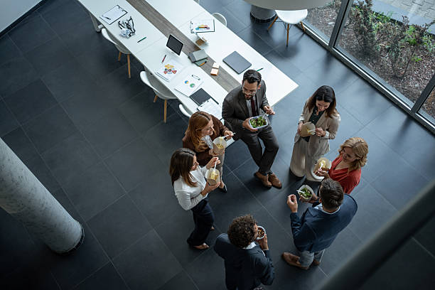 istock Business colleagues having lunch break in office building 2248789211