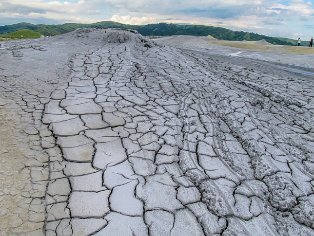 istock Mud volcano in Romania with cracked barren surface dry clay patterns geological landscape natural texture 2248798536
