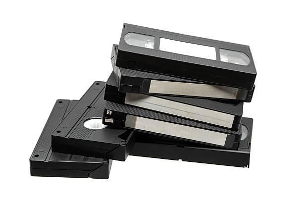 istock A stack of black VHS video cassettes piled against a clean white background. 2248798668