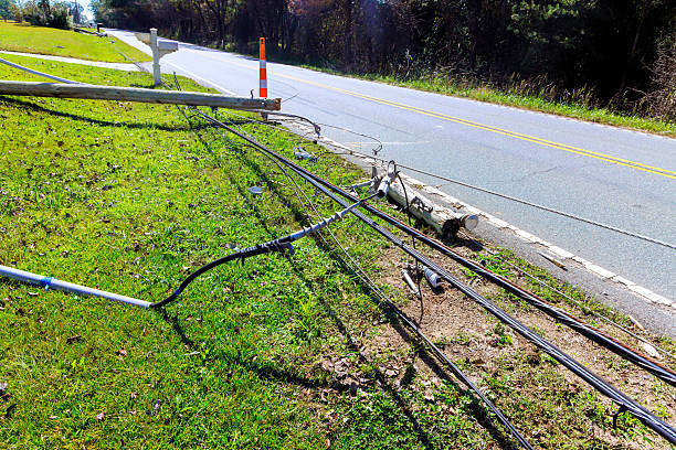 istock Downed power lines along roadside during tornado storm disruption to infrastructure 2248799545