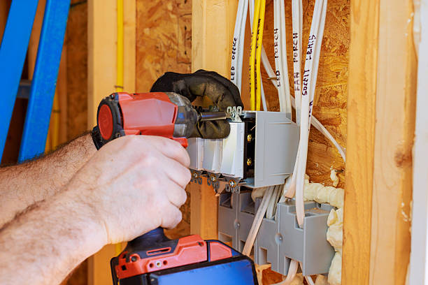 istock Electrician working on wiring installation in new construction building 2248799649