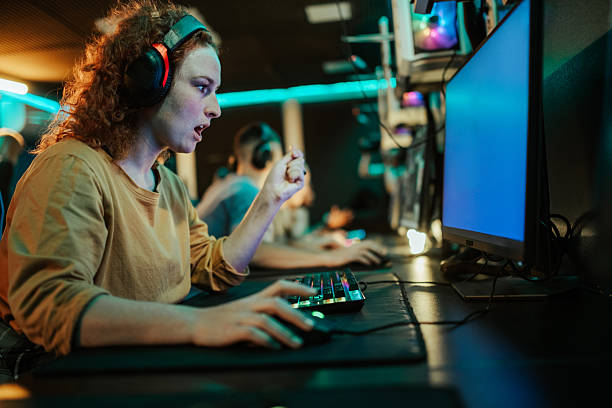 istock Focused woman gamer playing competitive online video game 2248800968