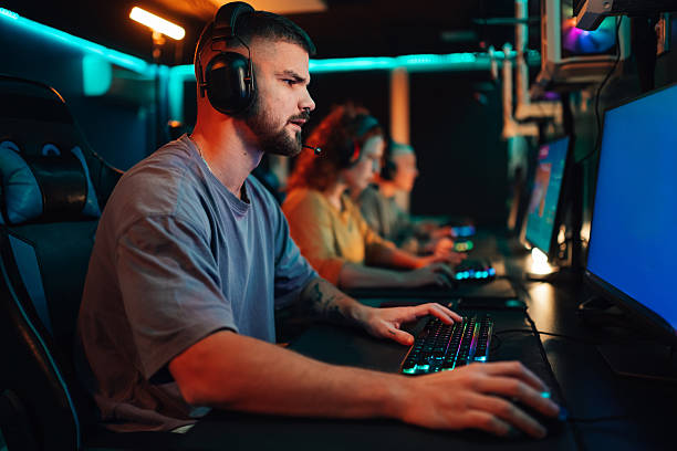 istock Male gamer playing video game on computer 2248800981