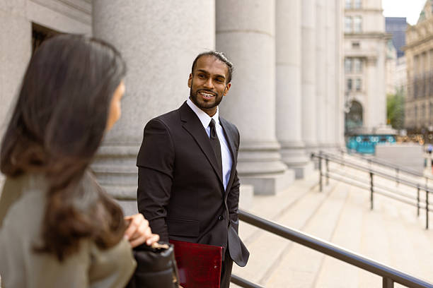 istock Business People Talking Outside Office Building 2248801911