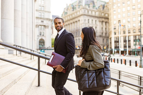 istock Business Professionals Walking Outside Office 2248801912