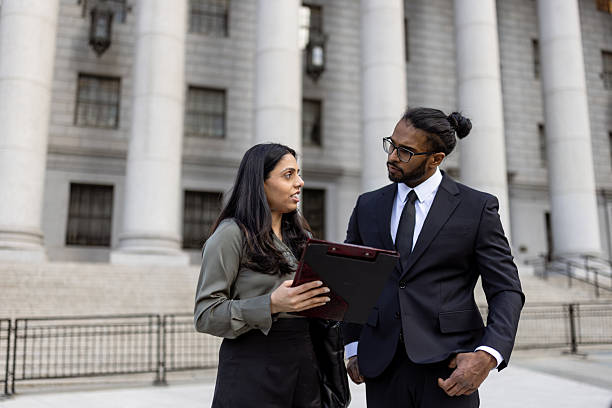 istock Business Discussion in Front of Office Building 2248801944