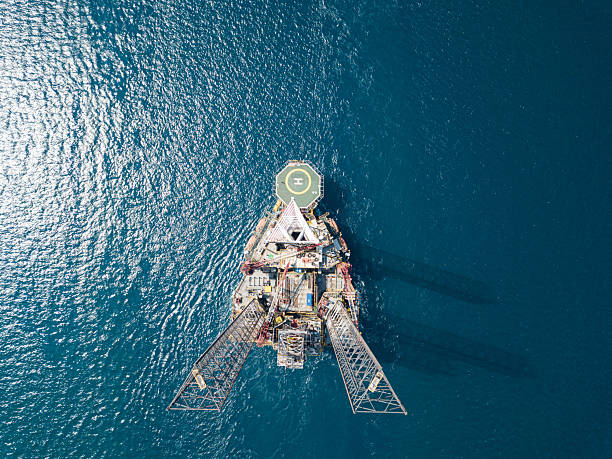 istock Jack up drilling rig in the middle of the ocean while rig move 2248802212