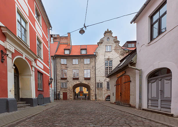 Historic Swedish Gate on cobblestone street in Old Town Riga, Latvia