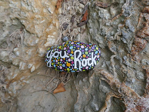 istock You rock kindness rock on ancient sandstone 2248807172