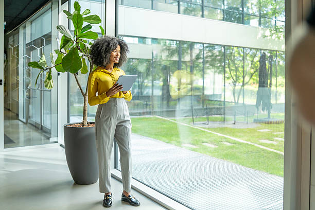 istock Young businesswoman using digital tablet in modern office 2248808165