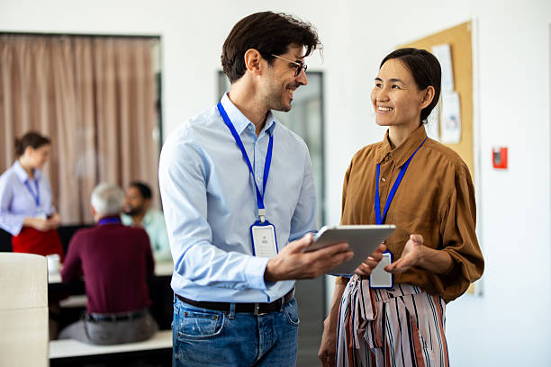 istock Business people collaborating using digital tablet at conference meeting 2248808434