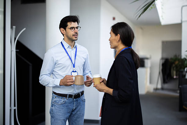 istock Business colleagues enjoying coffee break during conference networking 2248808507
