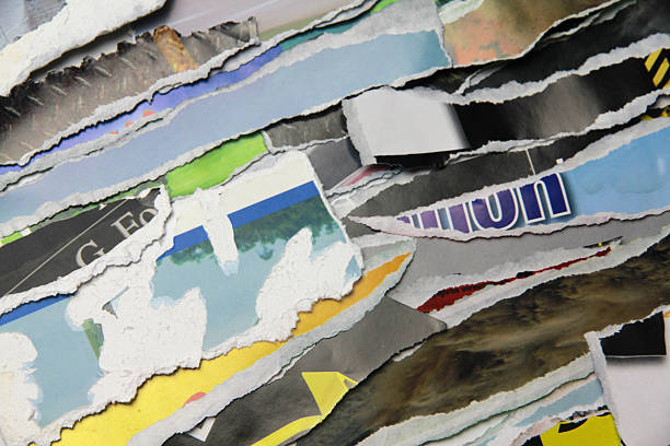 istock Multicolored poster paper, torn into numerous pieces. 2248811646