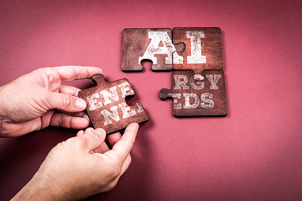 istock AI ENERGY NEEDS. People Connecting Rustic Lettered Jigsaw Pieces on Pink Surface 2248812479