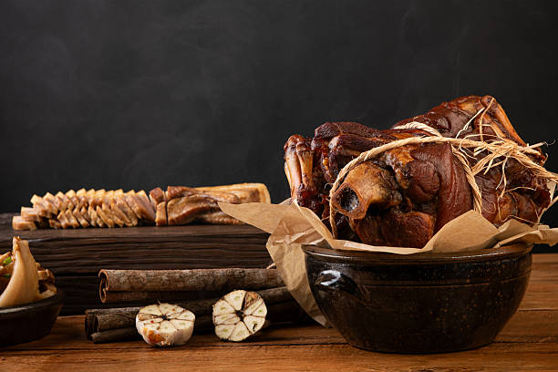 Steaming Smoked Pork Hocks in a Rustic Ceramic Pot