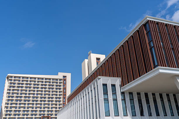 istock High rise buildings on a sunny day 2248817676