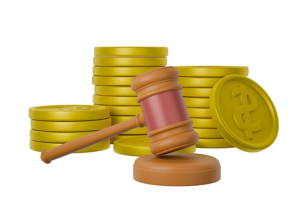 istock A gavel rests next to stacks of gold coins 2248822668