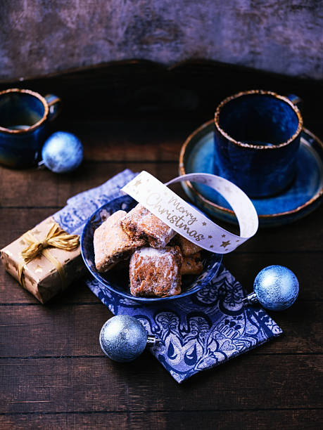 Traditional christmas cookies with gingerbread on rustic wooden background. Soft focus.
